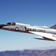 The second-to-last active duty F-106A Delta Dart flies over the Mojave Desert on its way to Davis-Monthan Air Force Base in Arizona where it will become a QF-106 drone. Before its retirement, this aircraft was used as a chase plane in the B-1B Lancer flight test program. (US Air Force)
